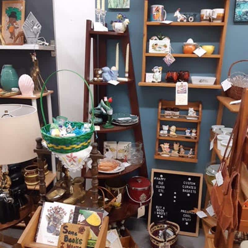 Vintage shop shelves with assorted collectibles and decor